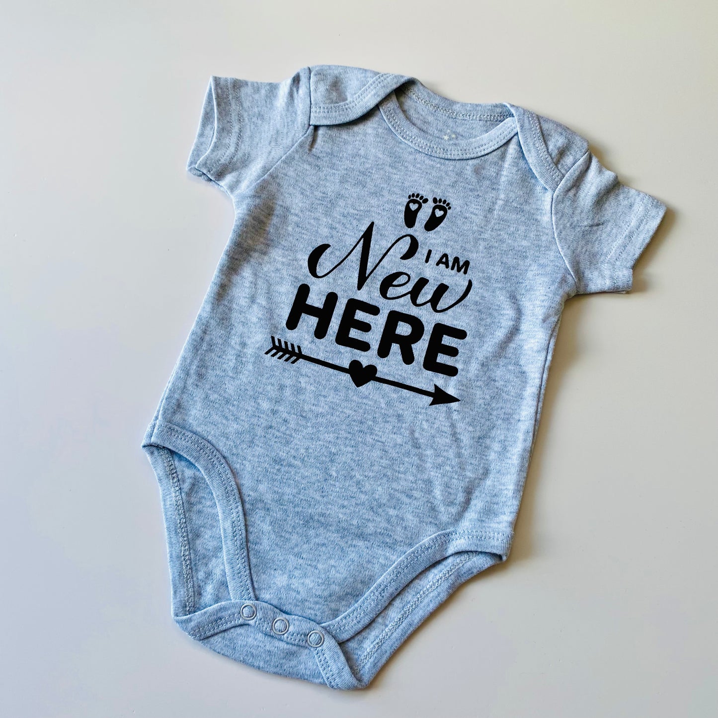 I Am New Here baby bodysuit